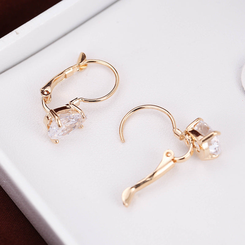 ✨ Boucles d’oreilles dorées goutte zircon – Élégance & éclat ✨